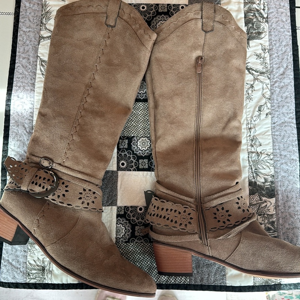 Brand new. Tried on but lived in the closet.Faux suede cowgirl boots Tan size 11